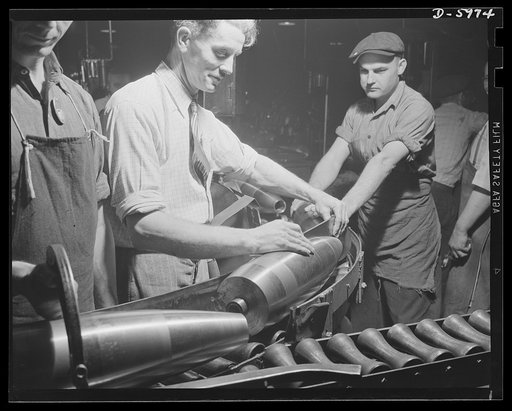 Production. 155mm shells. Inspection after the finish turning of straight and profile diameters of 155mm shells in a converted auto plant. Willy's, Toledo, Ohio