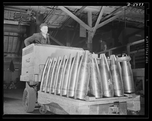 Production. 155mm shells. Transferring 155mm shells for finishing work in a converted auto plant. All machining operations on these shells have been completed and they are now on their way to the painting department. Willy's, Toledo, Ohio