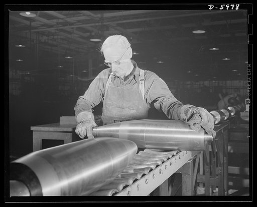 Production. 155mm shells. Threads cut in the noses of 155mm shells by Less-Bradner thread mills are inspected in a converted auto plant. Willy's, Toledo, Ohio