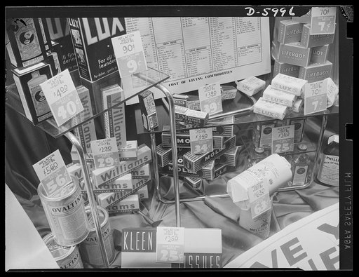 Price control. Anti-inflation window display. Using two-color tickets to show the consumer what might have happened if the government had not established the system of price control and required all stores to display the ceiling prices, this window is not only educational but also well merchandised.