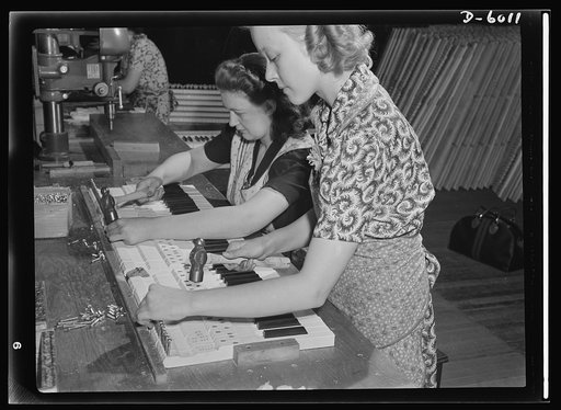 Conversion. Pianos to airplane motors. Preparing sharps and flats for a nation of jitterbugs has given way to the preparation of trainer-plane motors for a nation dedicated to victory, in this Chicago factory now converted to war production. Bernice Strutz (left) and Clara Bernas are pictured at the