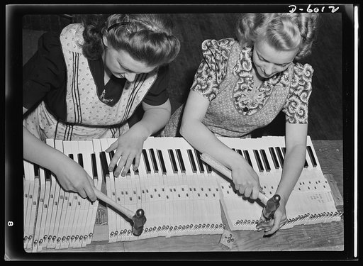 Conversion. Pianos to airplane motors. Preparing sharps and flats for a nation of jitterbugs has given way to the preparation of trainer-plane motors for a nation dedicated to victory, in this Chicago factory now converted to war production. Bernice Strutz (left) and Clara Bernas are pictured at the