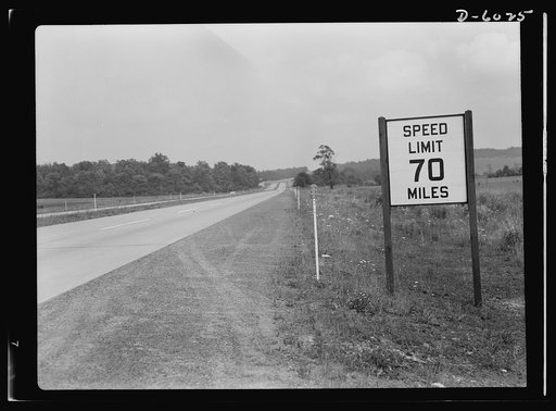 Gasoline rationing. A pre-war sign gives unnecessary warning to wartime motorists, when there are any, as weekday traffic on the Pennsylvania turnpike hits new lows