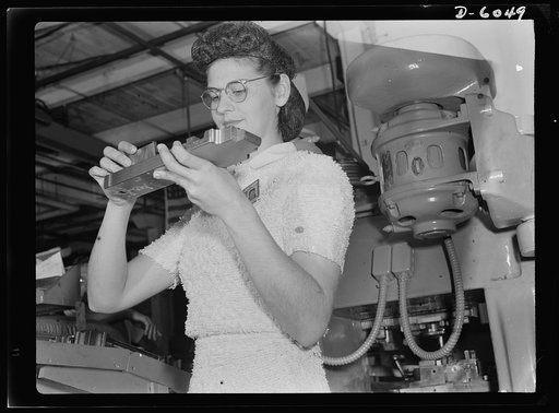 Women in war. Machine gun production operators. This capable young woman is making an important contribution to America's war effort. Employed by a Midwest plant, converted from the production of spark plugs to machine guns, she's one of many skilled women milling-machine operators who are producing