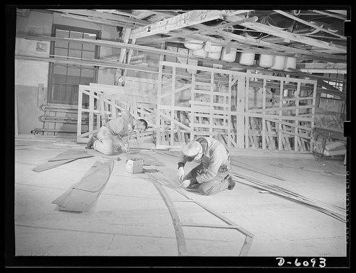 Production. Submarine chasers. Assembling frame templates in the mold loft of an eastern boatyard now engaged exclusively in the building of subchasers and other boats for the Navy. The templates are used as guides in the making of boat sections
