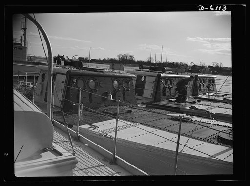 Production. Submarine chasers. They keep Uncle Sam's naval bombers in practice. Target boats nearing completion at an Eastern yard. Bombers drop sandbag "bombs" on the armored decks to sharpen their aim when they are handling the real "eggs of war." Marine Construction Company, Stamford, Connecticut