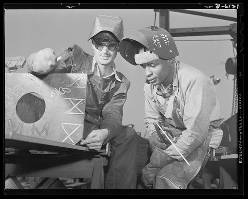 Construction of the liberty ship "Booker T. Washington." Howard Glover, right, and T.W. Cole, left, are shown fabricating the second deck of the "Booker T. Washington," first liberty ship named for a Negro at the California Shipbuilding Corporation's yards