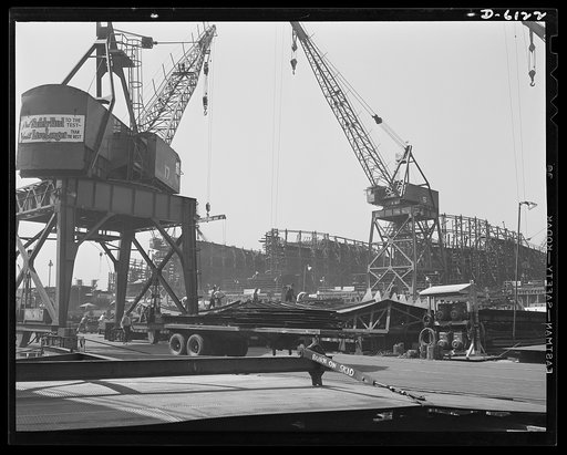 Construction of the liberty ship "Booker T. Washington." This general view of three shipways at the California Shipbuilding Corporation's yards shows three sister ships of the "Booker T. Washington," first liberty ship named for a Negro, being rushed to completion