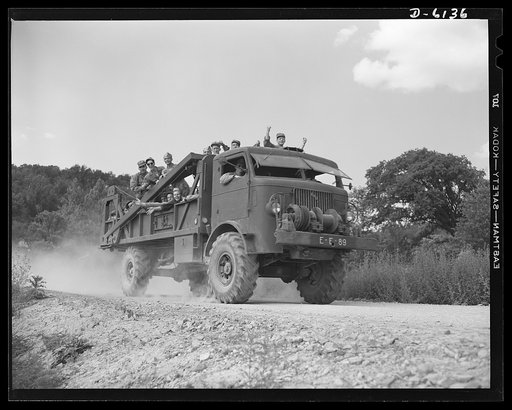 Fort Knox. Bridge construction trucks. Engineer units of the armored forces use special trucks like this for transporting and placing treadway bridges. Equipped with winches and crane members, these vehicles make quick work of laying bridge sections on pontoons. This particular truck is in use at Fo