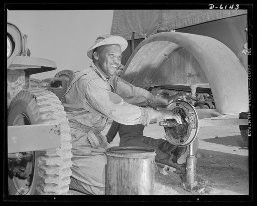 Fort Knox. Negro mechanics. Wheel job on an army truck at Fort Knox, Kentucky. This Negro soldier, who serves as truck driver and mechanic, plays an important part in keeping the army's transport fleets in service