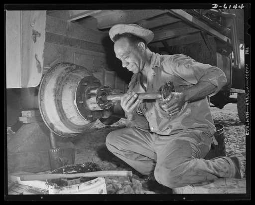 Fort Knox. Negro mechanics. Wheel job on an army truck at Fort Knox, Kentucky. This Negro soldier, who serves as truck driver and mechanic, plays an important part in keeping the army's transport fleets in service