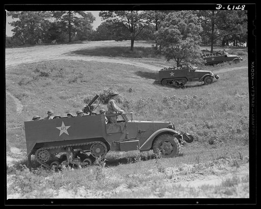 Fort Knox. Halftrac armored cars. Three halftrac armored cars move in formation as soldiers in training at Fort Knox, Kentucky practice some new methods in the art of mechanized warfare. Capable of rapid travel over difficult terrain, these versatile cars have many important uses in an army on the m