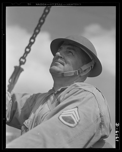 Fort Knox. Browning machine gun. This staff sergeant of the armored forces teaches young soldiers some of the fine points of mechanized warfare at Fort Knox, Kentucky. He gives Uncle Sam a mighty good value for his ninety-six dollars monthly base pay