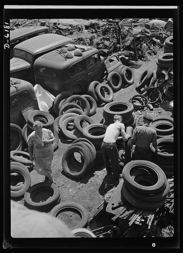 Salvage. Chicago automobile graveyard. Idle scrap: it belongs in the scrap. Covering well over an acre of ground, this automobile graveyard in Chicago holds tons of vital scrap metal and rubber for which Uncle Sam has urgent need in the manufacture of armaments and other war materials