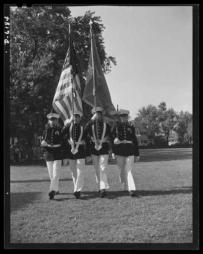 Marines dress parade. The Marines paraded in honor of Colonel William T. Clement when he was presented the Navy Cross for distinguished service in the Philippines. The presentation was made on July 17, 1942, in the courtyard of the Marine barracks in Washington, D.C.