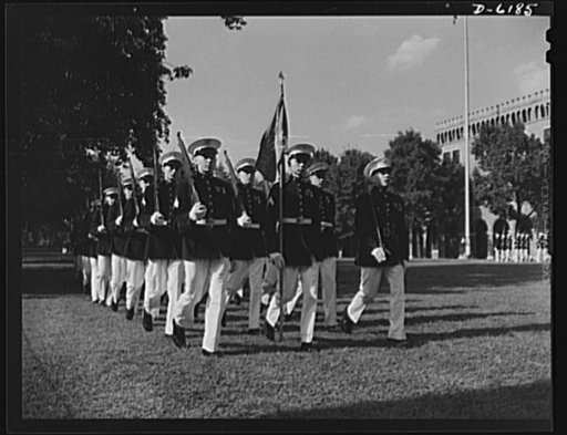 Marines dress parade. The Marines paraded in honor of Colonel William T. Clement when he was presented the Navy Cross for distinguished service in the Philippines. The presentation was made on July 17, 1942, in the courtyard of the Marine barracks in Washington, D.C.