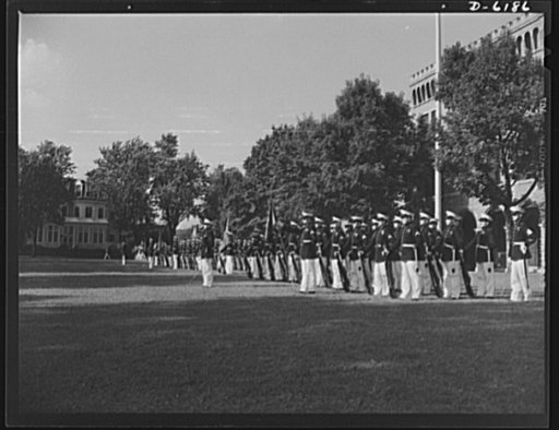 Marines dress parade. The Marines paraded in honor of Colonel William T. Clement when he was presented the Navy Cross for distinguished service in the Philippines. The presentation was made on July 17, 1942, in the courtyard of the Marine barracks in Washington, D.C.