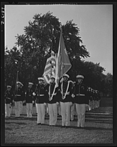 Marines dress parade. The Marines paraded in honor of Colonel William T. Clement when he was presented the Navy Cross for distinguished service in the Philippines. The presentation was made on July 17, 1942, in the courtyard of the Marine barracks in Washington, D.C.