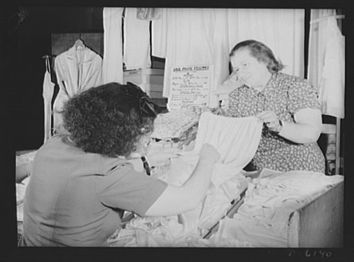 Posting ceiling prices in foreign languages. Ladies undergarments are covered by the General Maximum Price Regulations, so Mrs. Friedman, owner of a stand in one of New York's East Side marketplaces, has posted a price ceiling sign where it can be seen easily by her customers