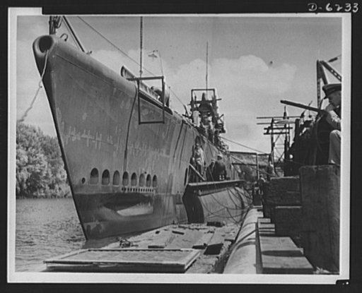 Production. Submarines. On the shores of America's inland waterways, many underwater crafts are being constructed. This submarine is undergoing finishing touches in a small bay at Manitowoc, Wisconsin