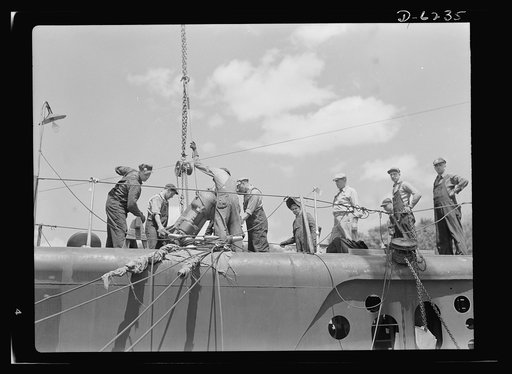 Production. Submarines. Installation of an engine part in a submarine under construction at Manitowoc, Wisconsin