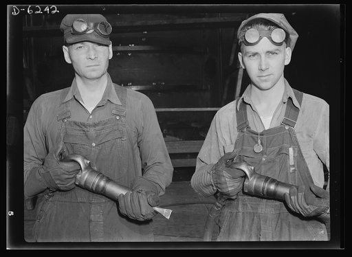 Production. Submarines. Men of America's army of production. The nation's underwater craft are being launched in record time because of men like these two who work on a construction crew at the Navy's shipyard in Manitowoc, Wisconsin