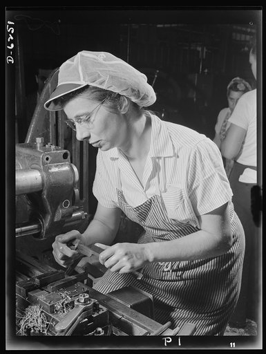 Production. Machine guns of various calibers. Mayna Lentz performs a milling machine operation on the pawl pin of a machine gun that will tell the Axis about the superiority of American weapons. This girl operator in a large Eastern plant is one of many women arsenal workers producing essential weap