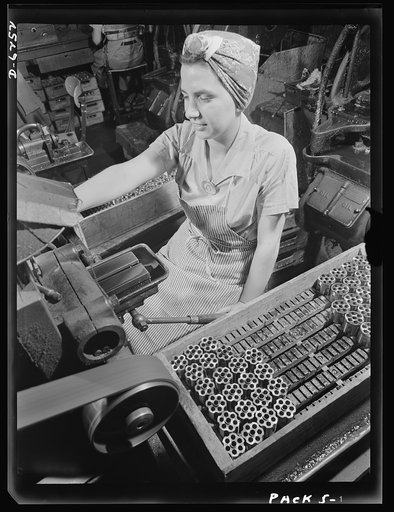 Production. .38-caliber revolvers. Angela Cherubini, hand miller at a large firearms plant, machines bolt holes on the cylinder of .38-caliber revolvers. Many women, as well as men, are employed in this plant which produces machine guns and automatic pistols for the armed forces