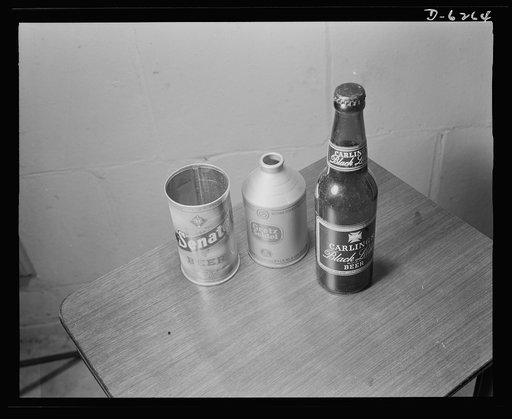 Substitute materials containers. Brewers introduced the metal can for beer, but the brew is back in bottles for the duration. Left to right: flat-top metal, crown-top metal can, standard bottle