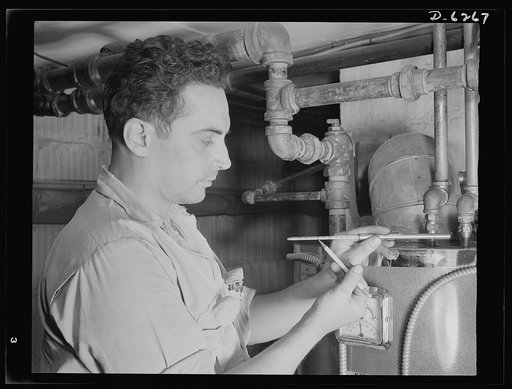 Fuel oil conservation. An experienced serviceman checks the efficiency of the family heating plant. This man measures the draft, the amount of heat lost through the chimney, and the carbon dioxide content of the flue gases. His work resulted in cutting down fuel consumption more than nineteen per ce