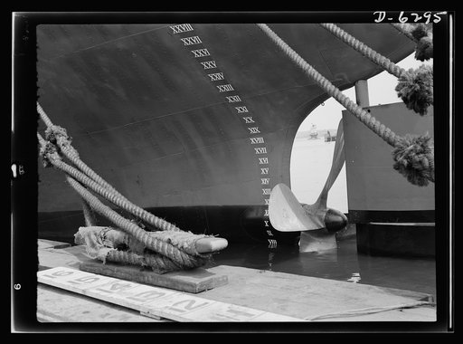 Ship launching in Portland, Maine. Stern of a newly completed ship at a New England shipyard, one of five cargo-carrying vessels built for Britain which were christened at a mass launching in New England on August 16, 1942. The five ships were constructed under lend-lease and sent to England immedia