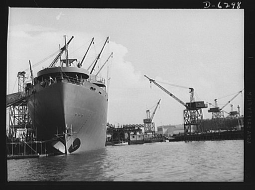 Ship launching in Portland, Maine. A mass launching that made history in Maine shipbuilding took place August 16, 1942, when eight vessels slid into the water. One of the five British cargo-carrying ships which were christened is here being prepared for launching