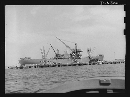 Ship launching in Portland, Maine. Maine shipbuilders saw the greatest launching in Maine shipbuilding history one day when eight vessels slid into the water on August 16, 1942. Liberty ship Ethan Allen was launched along with five British cargo- carrying vessels and two destroyers