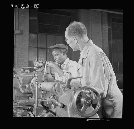 Training. Work Projects Administration (WPA) vocational school. Competent instructors and well-equipped shops make for a successful vocational training school. This experienced Negro machinist is teaching a young Negro trainee the intricacies of lathe operation. After completion of the course in the