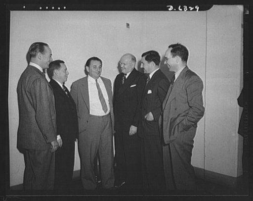 Meeting on wartime economies for retailers, September 29, 1942. Left to right: R.A. Black, L.H. Harris, L. Henderson, J.M. Johnson, L.J. Ruskin, Walter Thompson