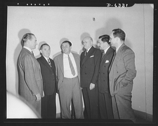 Meeting on wartime economies for retailers, September 29, 1942. Left to right: R.A. Black, L.H. Harris, L. Henderson, J.M. Johnson, L.J. Ruskin, Walter Thompson