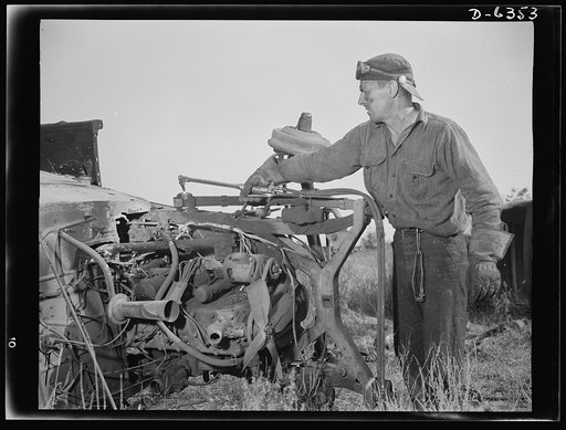 Automobile salvage. The torch man cuts the motor from the frame, and the frame from the body, then these parts are sorted for shipment. The springs and drive shaft are cut from the frame by torch, as are the differential and transmission