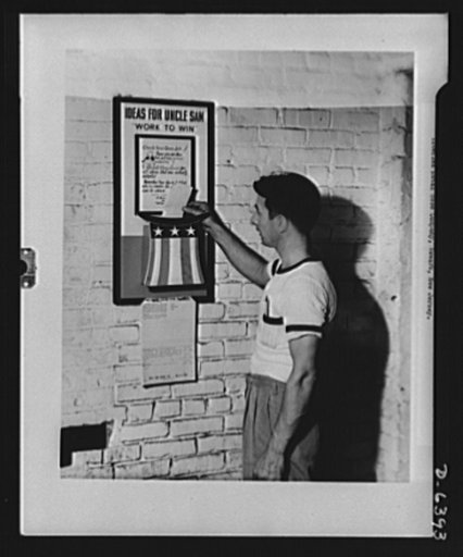 The labor-management committee of the Titeflex Metal House Company, Newark, New Jersey set up this suggestion box to enlist employee's ideas for stimulating war production. Local and national awards are made for suggestions accepted