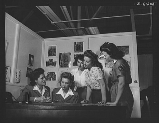 Health and welfare activities. North American Aviation. All work and no play is very much against company policy at North American Aviation in Inglewood, California. Bonnie Edlund (left), NAA's Coordinator of Women's Activities, discusses scheduled sports activities with a group of factory and offic