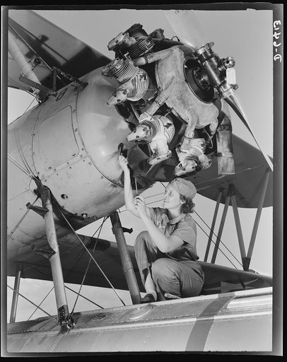 Naval air base Corpus Christi, Texas. A top-notch mechanic, Mary Josephine Farley, expertly rebuilds airplane engines. Although she's only twenty-years-old, she has a private pilot's license and has made several cross-country flights. She ranked highest of all competitors on her civil service examin