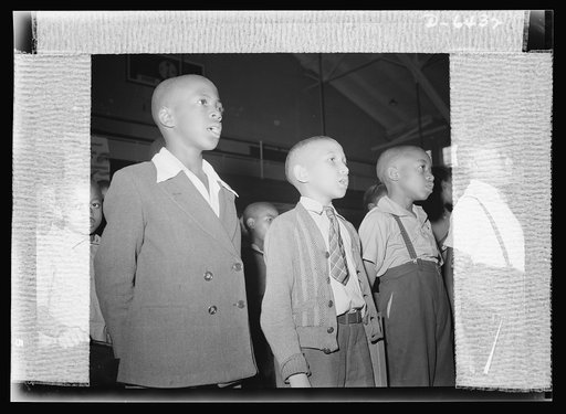Manpower, junior size. Junior commando spirits ran high when children of all creeds and colors sang together the national anthem. Roanoke, Virginia school children took the initiative in mobilizing the first intensified junior commando organization to collect scrap for America's fighting forces