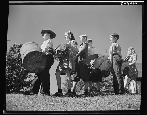 Manpower, junior size. Too young to help? Not the youngsters of Roanoke, Virginia. They're out to win the war by gathering up every piece of scrap metal, every bit of worn out rubber, and all waste fats and greases in the town