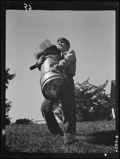 Manpower, junior size. Johnny's got a man-sized job for the duration. His role in this war is a vital one, for every bit of household scrap must be collected to feed America's wartime steel furnaces. Like this Roanoke, Virginia youngster, boys and girls from coast to coast are organizing into squads