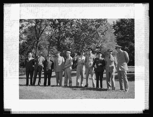 Montgomery Blair High school Victory Corps. Gold braid and official titles decorated the training field at Montgomery Blair High School in Silver Spring, Maryland, when Army, Navy, and civilian officers reviewed the Victory Corps maneuvers. Left to right: Merwin M. Peake, Chief, Pre-Induction Traini