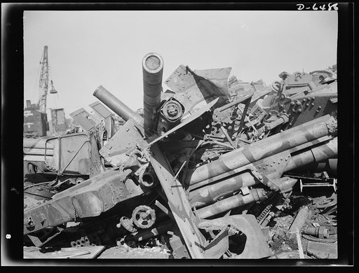 Scrapped cannon. Veterans of World War I, these cannons join the scrap heap to be reprocessed and recast into streamlined equipment that will be aimed once more at the enemy