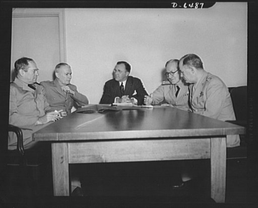 Production Executive Committee. First meeting of Production Executive Committee of the War Production Board (WPB). Charles E. Wilson, President of General Electric Company and WPB Vice Chairman of the Committee. Committee members, left to right: Rear Admiral Howard L. Vickery, Vice Chairman, U.S. Ma