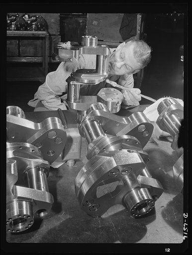 Production. Pratt and Whitney airplane engines. Crankshaft assembles for Pratt and Whitney airplane engines must undergo a rigid inspection in a large Eastern war plant now working full tilt to supply our armed forces with power installations for our war planes. Pratt and Whitney Aircraft
