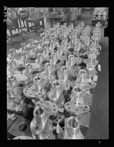 Production. Pratt and Whitney airplane engines. Crankshafts lined up for assembly in Pratt and Whitney airplane engines form an interesting pattern on the floor of a large Eastern plant working to capacity to supply power to drive our warplanes. Pratt and Whitney Aircraft