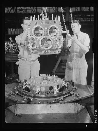 Production. Pratt and Whitney airplane engines. A power section assembly is lowered to blower case assembly as another Pratt and Whitney airplane engine begins to take form at a large Eastern plant producing great numbers of power installations for our fighting aircraft. Pratt and Whitney Aircraft