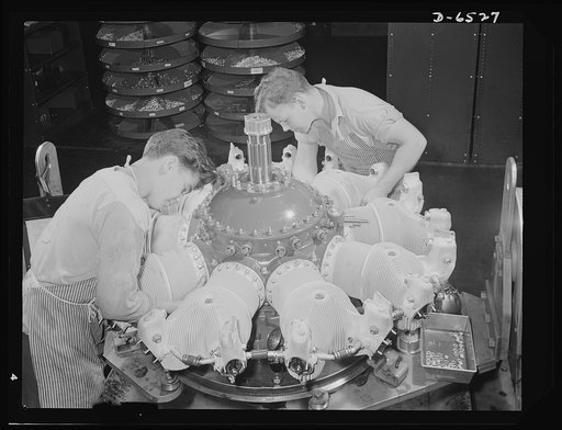 Production. Pratt and Whitney airplane engines. Cylinders are placed on a single-row Pratt and Whitney airplane engine, one of thousands now being produced in a large Eastern plant. Pratt and Whitney Aircraft